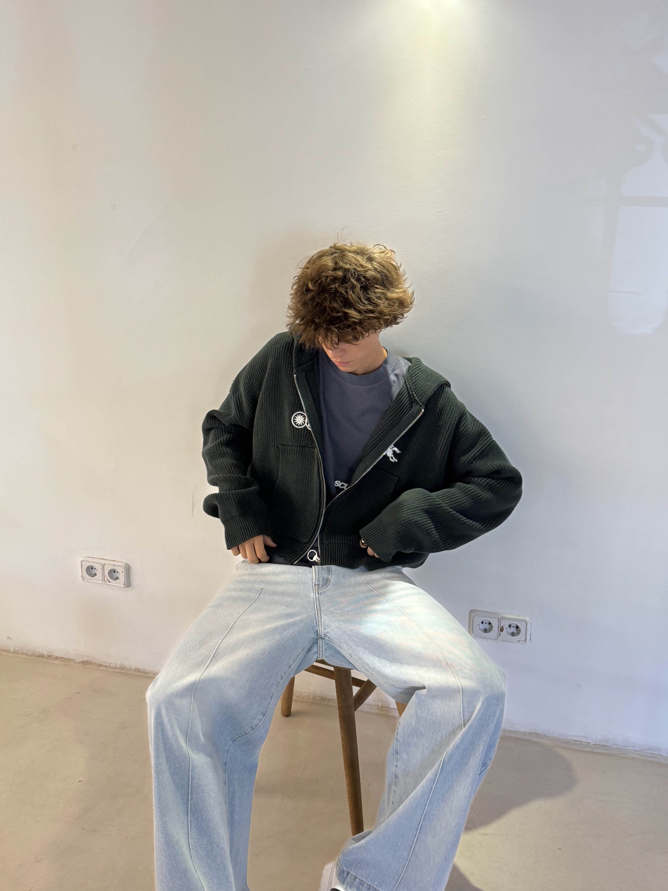 Emblema Verde Cremallera de Punto