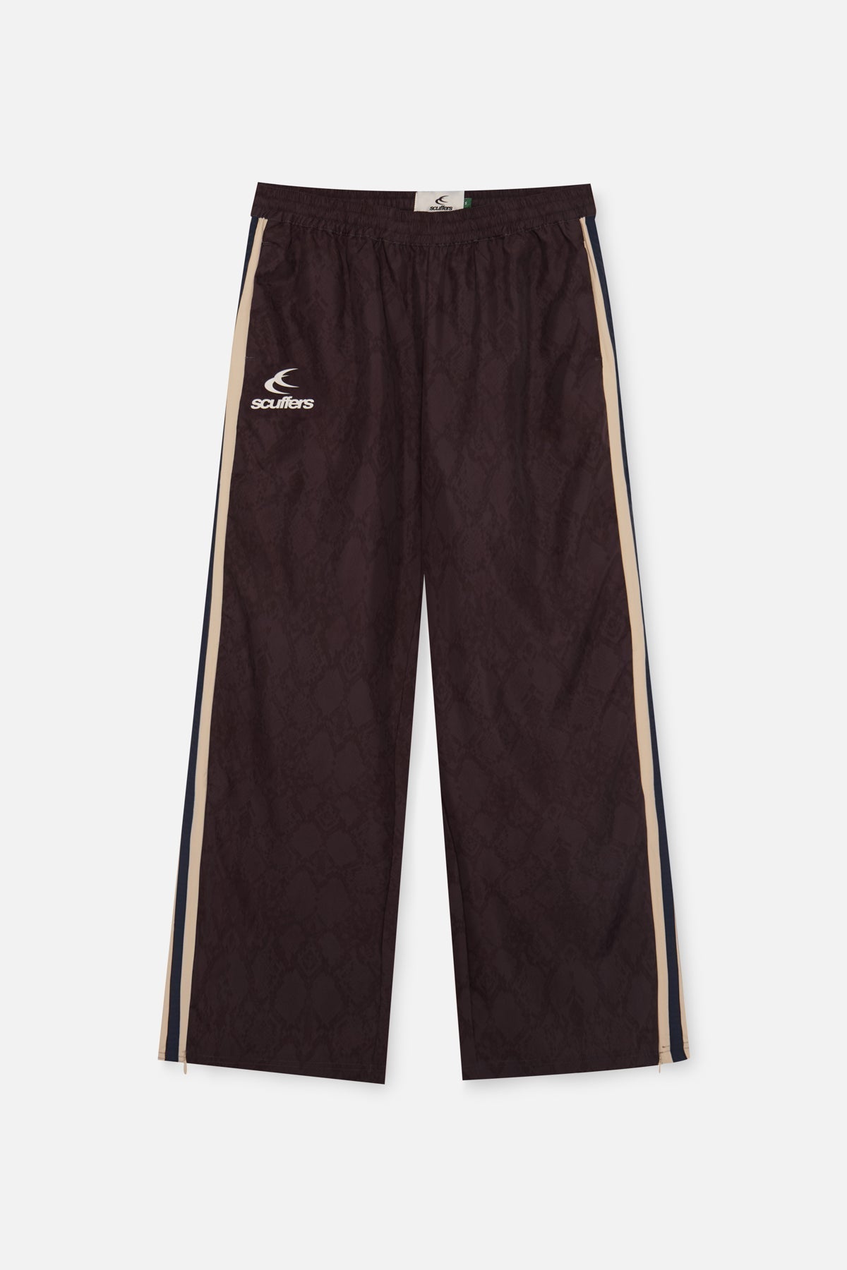 Pantalones técnicos oscuros de serpiente